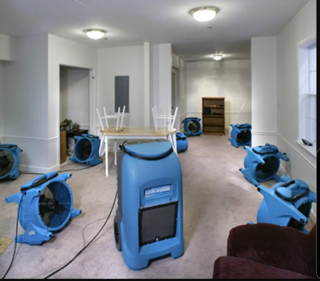 Air movers and dehumidifier setup for Water Extraction & Removal in Carney